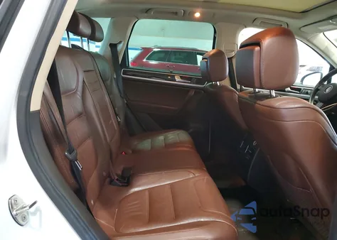 2013 Volkswagen Touareg Hybrid z USA, uszkodzony, nr VIN WVGEG9BP6DD001499